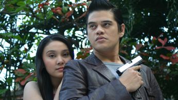 Winston Elizalde and Joanne Miller in Big Time (2005)