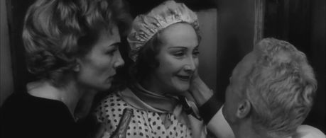 Jacques Harden, Margo Lion, and Catherine Lutz in Lola (1961)