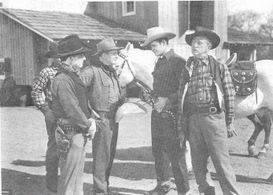 Johnny Carpenter, Sunset Carson, Bud Geary, and Olin Howland in Santa Fe Saddlemates (1945)