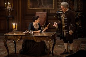 Simon Callow and Caitríona Balfe in Outlander (2014)