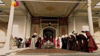 Arif Erkin Güzelbeyoglu, Halit Ergenç, and Ilker Aksum in The Magnificent Century (2011)
