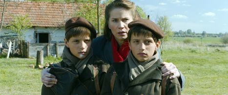 Gyöngyvér Bognár, László Gyémánt, and András Gyémánt in The Notebook (2013)