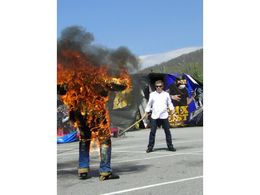 John Cann being lit on fire by lengendary stuntman Buddy Joe Hooker at Action Fest 2011 Stunt Show in Asheville NC