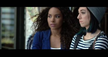 Still shot of Ashley D. Merritt with singer Christina Grimmie for music video 