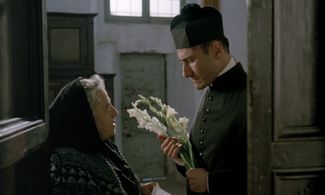 Carlo Di Maio and Linda Moretti in The Postman (1994)