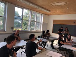 Jen Gardiner talking to Rob Letourneau along with the cast on the set of A Double-Edged Sword