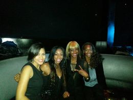Amaris Davidson, U.S. Olympian LaShinda Demus, and teammates at the 2012 Manifest Your Destiny Toy Drive