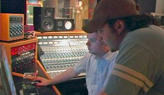J.P. Riley and engineer Paul Long mixing tracks to appear in the Act Naturally soundtrack at Gravity Studios, Chicago IL