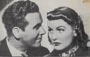 Whitney Bourne and Preston Foster in Double Danger (1938)