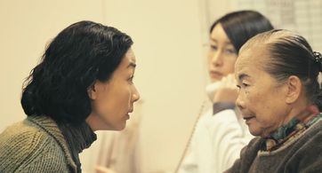Hailu Qin, Elena Kong, and Pik Kee Hui in A Simple Life (2011)