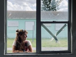 Katja Esson filming in Liberty Square, Miami