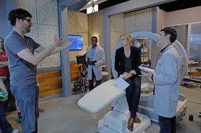 Simon Quarterman, Craig Siebels, Brandon Scott, and Emma Ishta in Stitchers (2015)