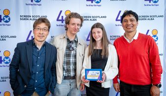 Euan Alexander (2n from L),Elizabeth Beattie and Gele Bishokarma pose with Don Ng at the award party of 48-Hour Film Pr