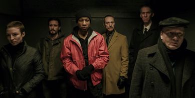 Captive State. Left to Right: Caitlin Ewald, James Ransone, Jonathan Majors, Ben Daniels, Lawrence Grimm, Guy Van Sweari
