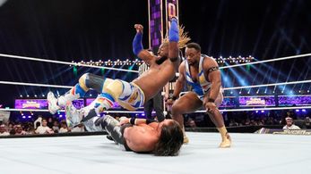 John Hennigan, Kofi Kingston, and Ettore Ewen in WWE Super Show-Down (2020)