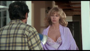 Bobbie Bresee and Maurice Sherbanee in Mausoleum (1983)