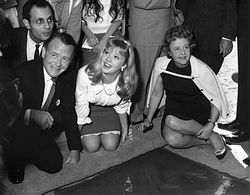 Hayley Mills with parents John Mills and Mary Hayley Bell in front of Grauman's Chinese Theatre February 22, 1964