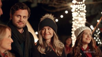 Lea Thompson, Lyndsy Fonseca, Nicholas Delany, and Paige Herschell in Next Stop, Christmas (2021)