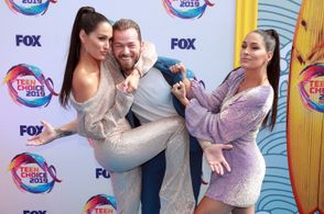 Artem Chigvintsev, Brie Bella, and Nikki Bella