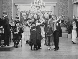 Charles Chaplin, Eric Campbell, Charlotte Mineau, and Edna Purviance in The Count (1916)