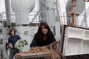 Dr. Flynn (Mitch) provides support to Dr. Sparks (Ming-Na Wen). Production still, Super Cyclone