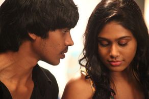 Manisha Yadav and Santhosh Ramesh in Aadhalal Kadhal Seiveer (2013)