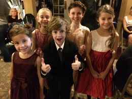 Madeline Hirvonen, Luke Roessler, and Islie Hirvonen on the set of 