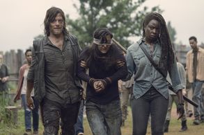 Norman Reedus, Danai Gurira, Karen Ceesay, and Cassady McClincy in The Walking Dead (2010)