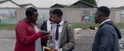 Wunmi Mosaku and Rasaq Kukoyi in His House (2020)
