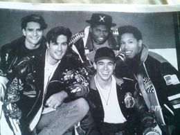 Erik Betts (far rt) as lead singer of the group 5 IS A JAMM performing 