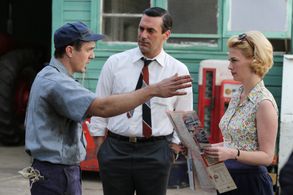 January Jones, Jon Hamm, and Lucius Baybak in Mad Men (2007)