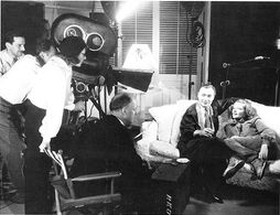 Katharine Hepburn, Charles Boyer, Robert De Grasse, and Philip Moeller in Break of Hearts (1935)