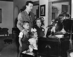 Joan Blondell, Dick Powell, Ellen Powell, and Norman S. Powell