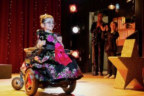 Sammi Haney as Esperanza on Raising Dion getting ready to sing!