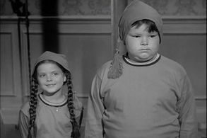 Lisa Loring and Ken Weatherwax in The Addams Family (1964)