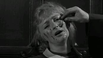 Lorna Hanson and Ronald Lewis in Mr. Sardonicus (1961)