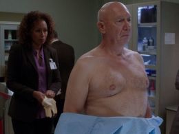 Dann Florek and Tamara Tunie in Law & Order: Special Victims Unit (1999)