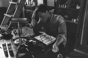 Spencer on set prepping for scene.