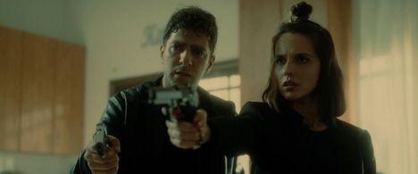 Moshe Ashkenazi and Yana Yossef in Unorganized Crime (2022)