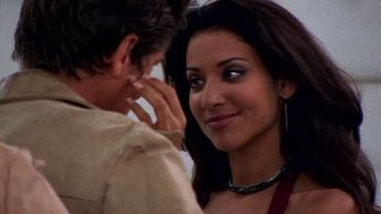 Idalis DeLeon and Vincent Ventresca in The Invisible Man (2000)