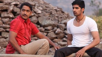 Chinmay Mandlekar and Akshay Waghmare in Hou De Jarasa Ushir (2012)