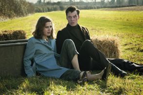 Jack Bannon and Emma Paetz in Pennyworth (2019)