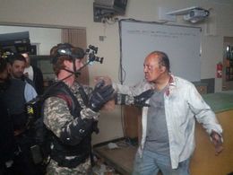 John Kreng attacks a soldier in PANDEMIC.