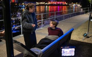 Mel directs actor Finn Treacy on the set of Charlie