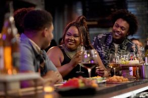 Nicole Byer, Aaron Jennings, and Echo Kellum in Grand Crew (2021)