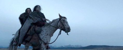 Leonardo DiCaprio and Arthur RedCloud in The Revenant (2015)