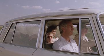 John Hurt, Tim Roth, Terence Stamp, and Laura del Sol in The Hit (1984)