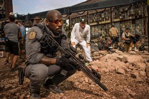 Still of Remi Adeleke and Michael Bay in Transformers The Last Knight