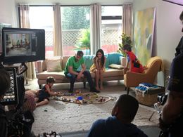 Isaiah Dell with set family on Hulu commercial