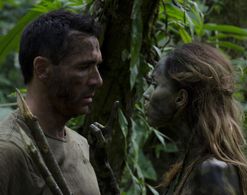 Adrian Paul and Bali Rodriguez in AE: Apocalypse Earth (2013)